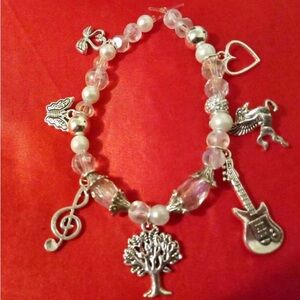 Silver Charm Bracelet with Musical and Nature Accents